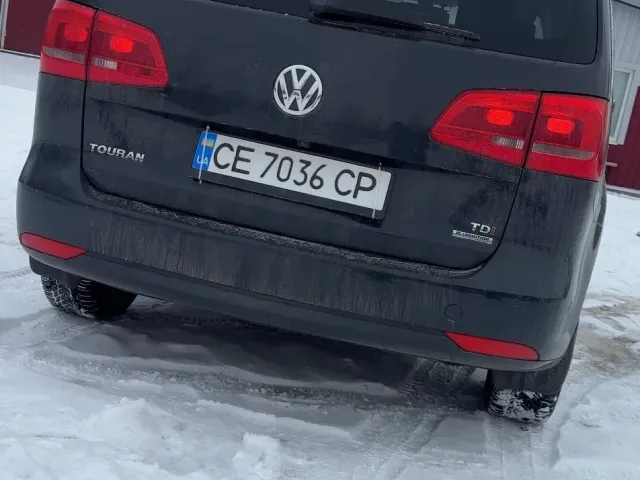 Volkswagen Touran - фото 2