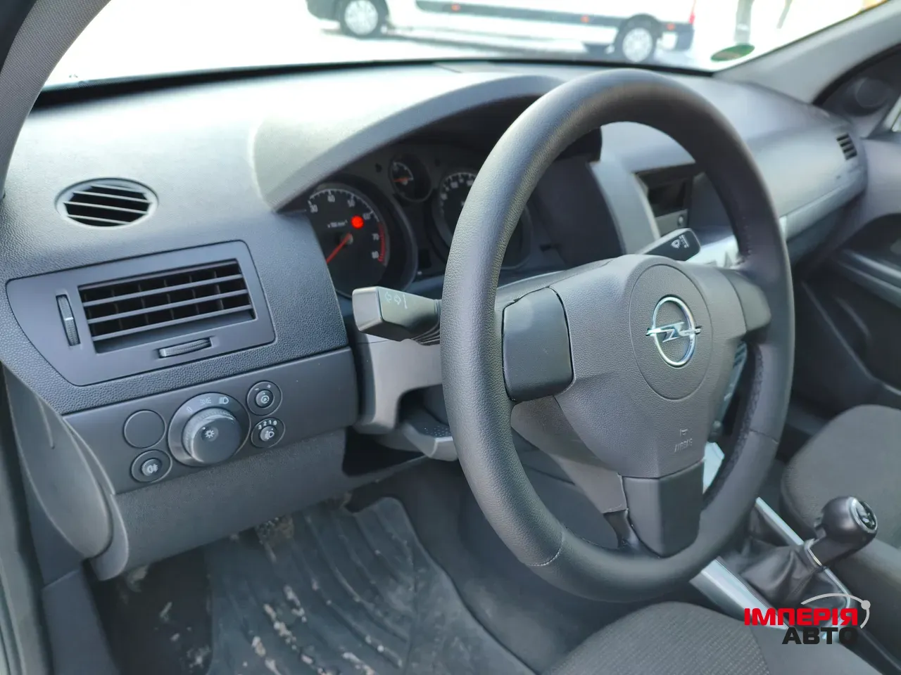 Opel Astra - фото 32