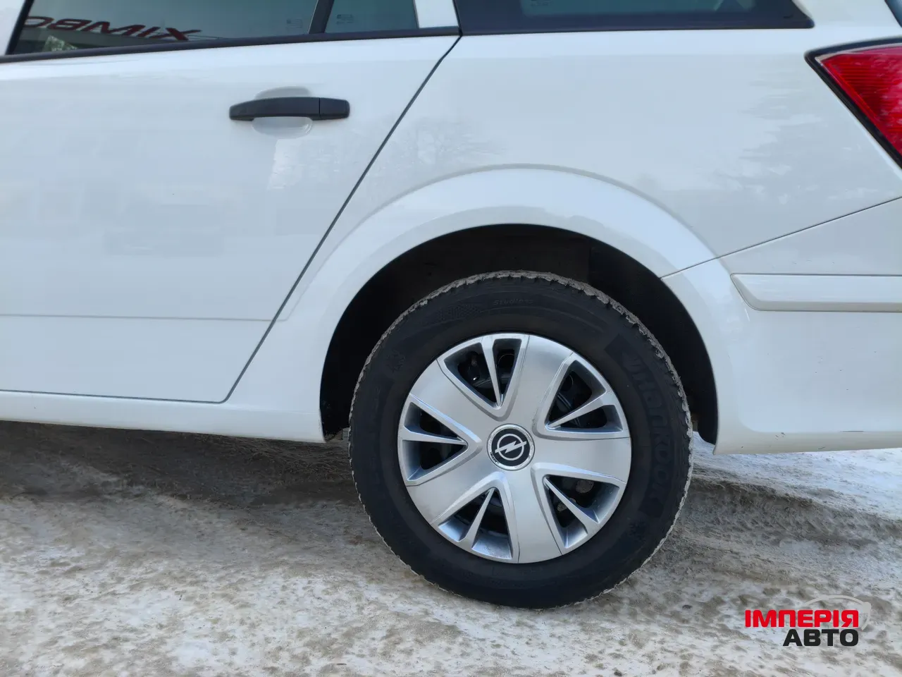 Opel Astra - фото 19