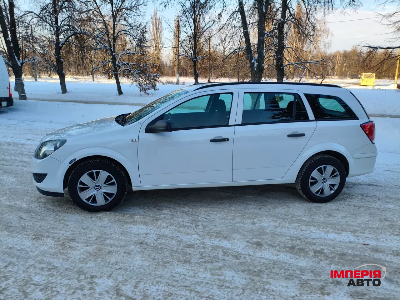 Opel Astra - фото 13