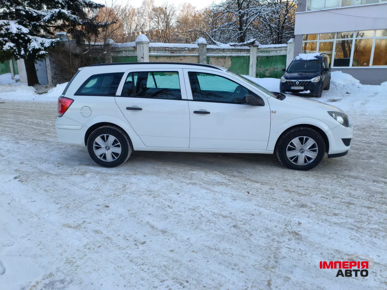 Opel Astra - фото 8