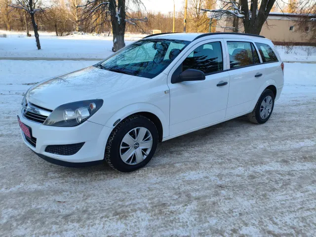 Opel Astra - фото 1