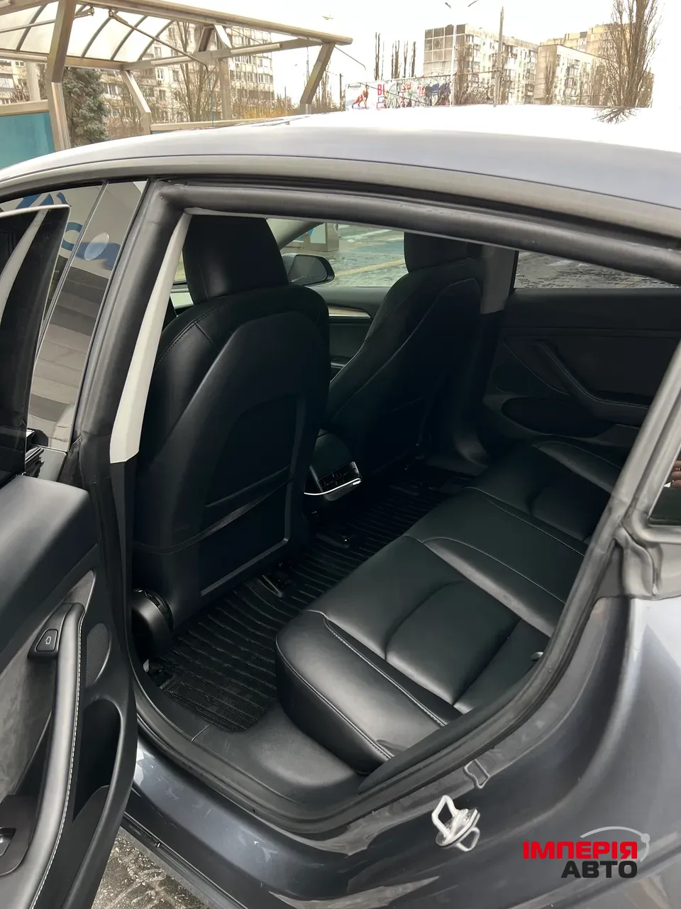 Tesla Model 3 - фото 12