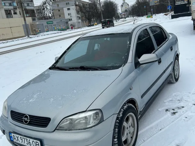 Opel Astra - фото 1