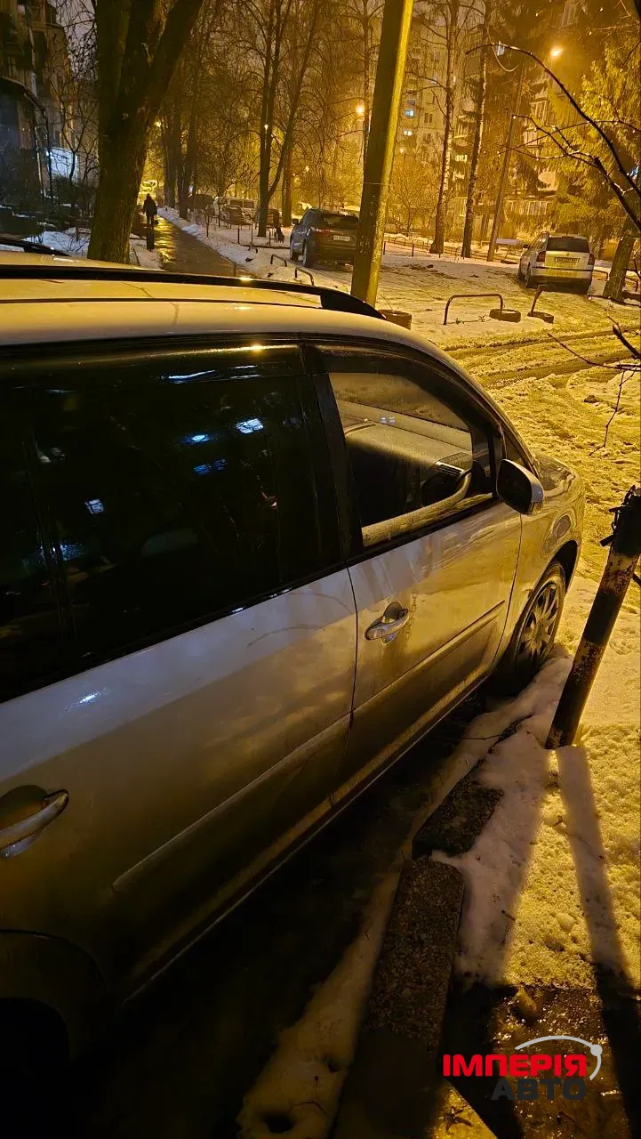 Volkswagen Touran - фото 4