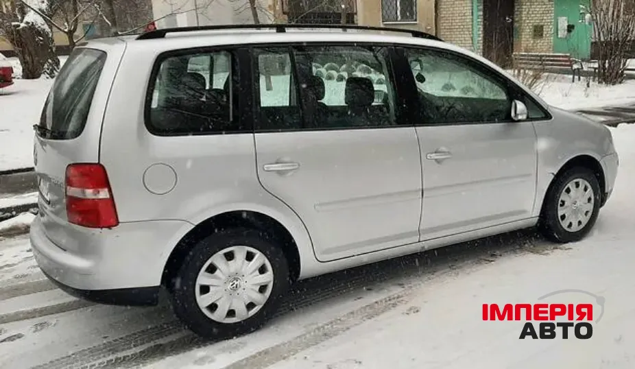 Volkswagen Touran - фото 14