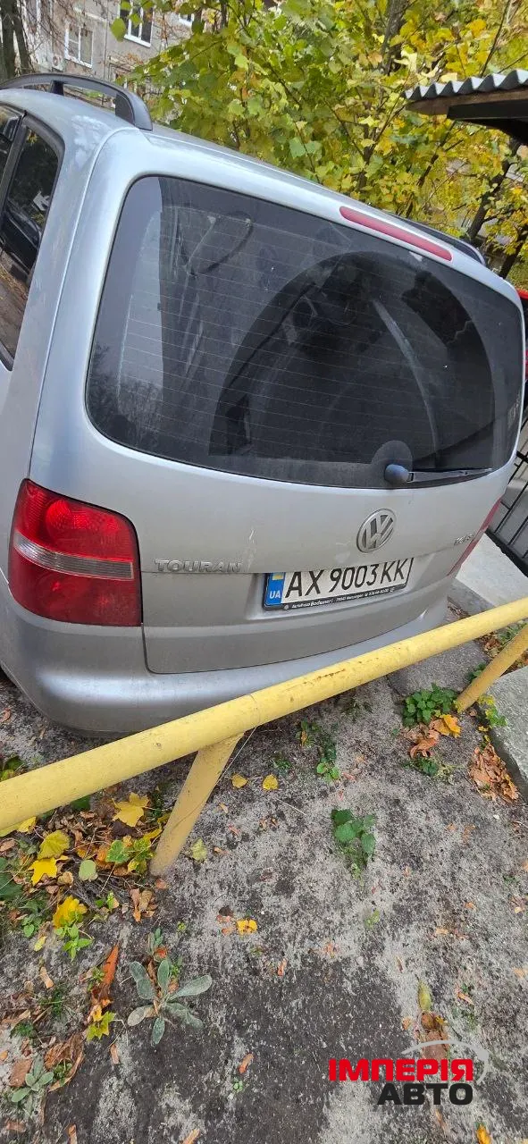 Volkswagen Touran - фото 16