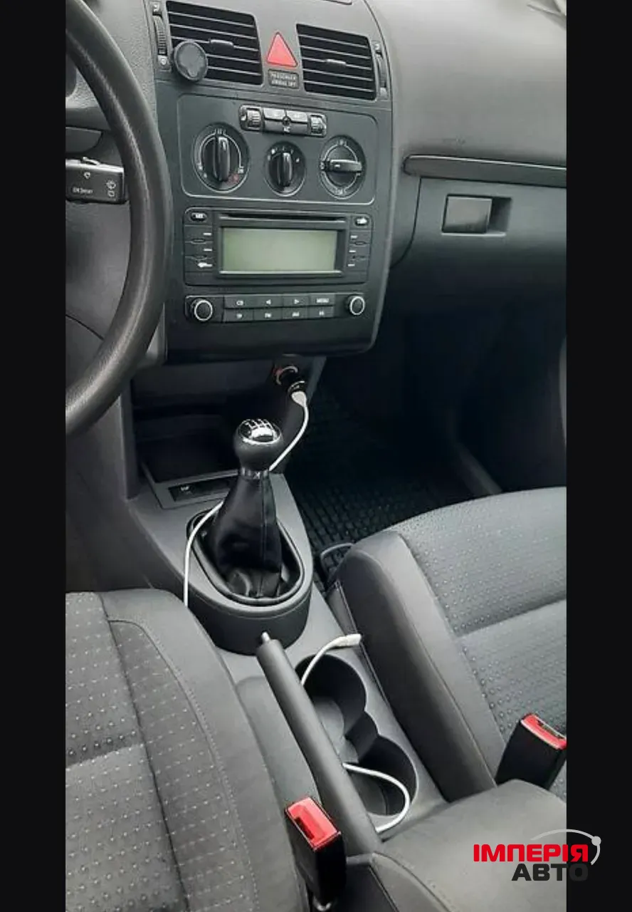 Volkswagen Touran - фото 8