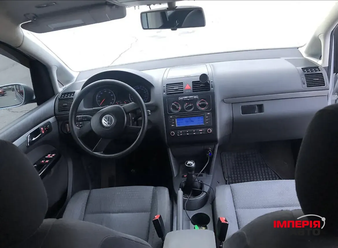 Volkswagen Touran - фото 11