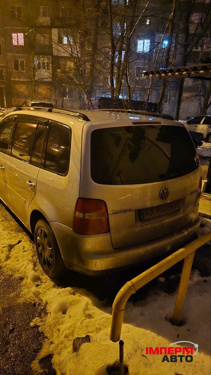 Volkswagen Touran - фото 3