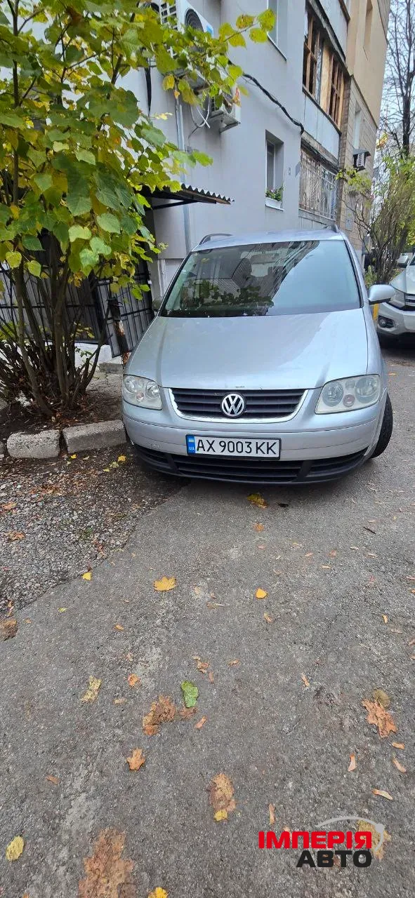 Volkswagen Touran - фото 15