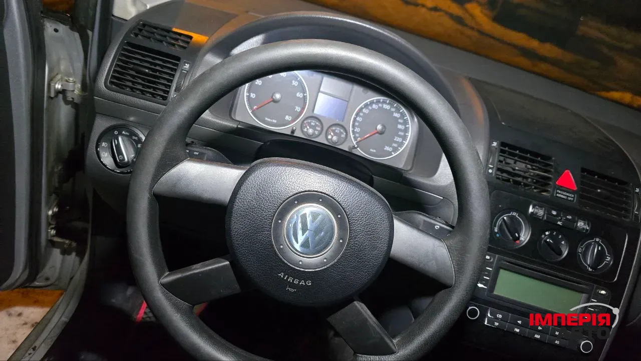 Volkswagen Touran - фото 7