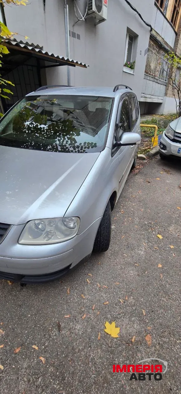 Volkswagen Touran - фото 17