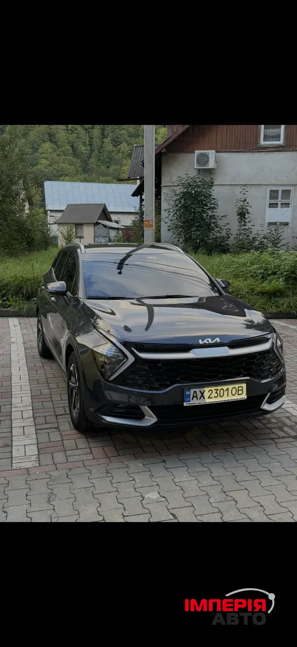 Kia Sportage - фото 1