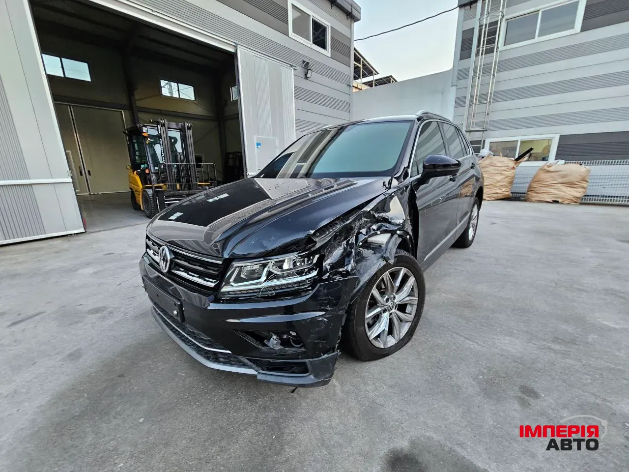 Volkswagen Tiguan - фото 2