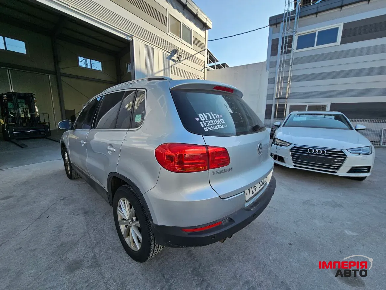 Volkswagen Tiguan - фото 8