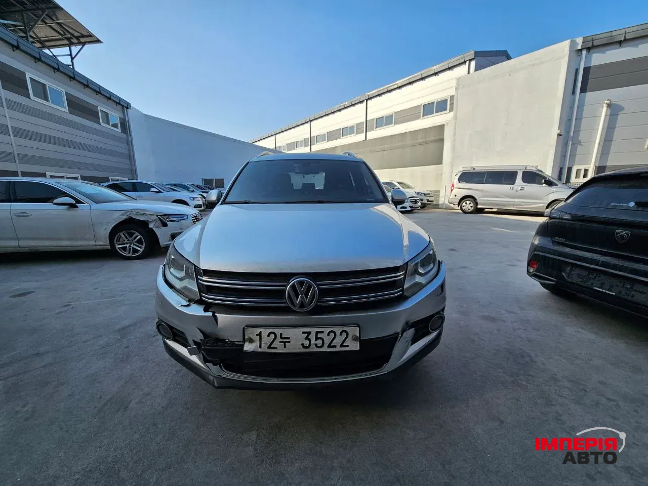 Volkswagen Tiguan - фото 2