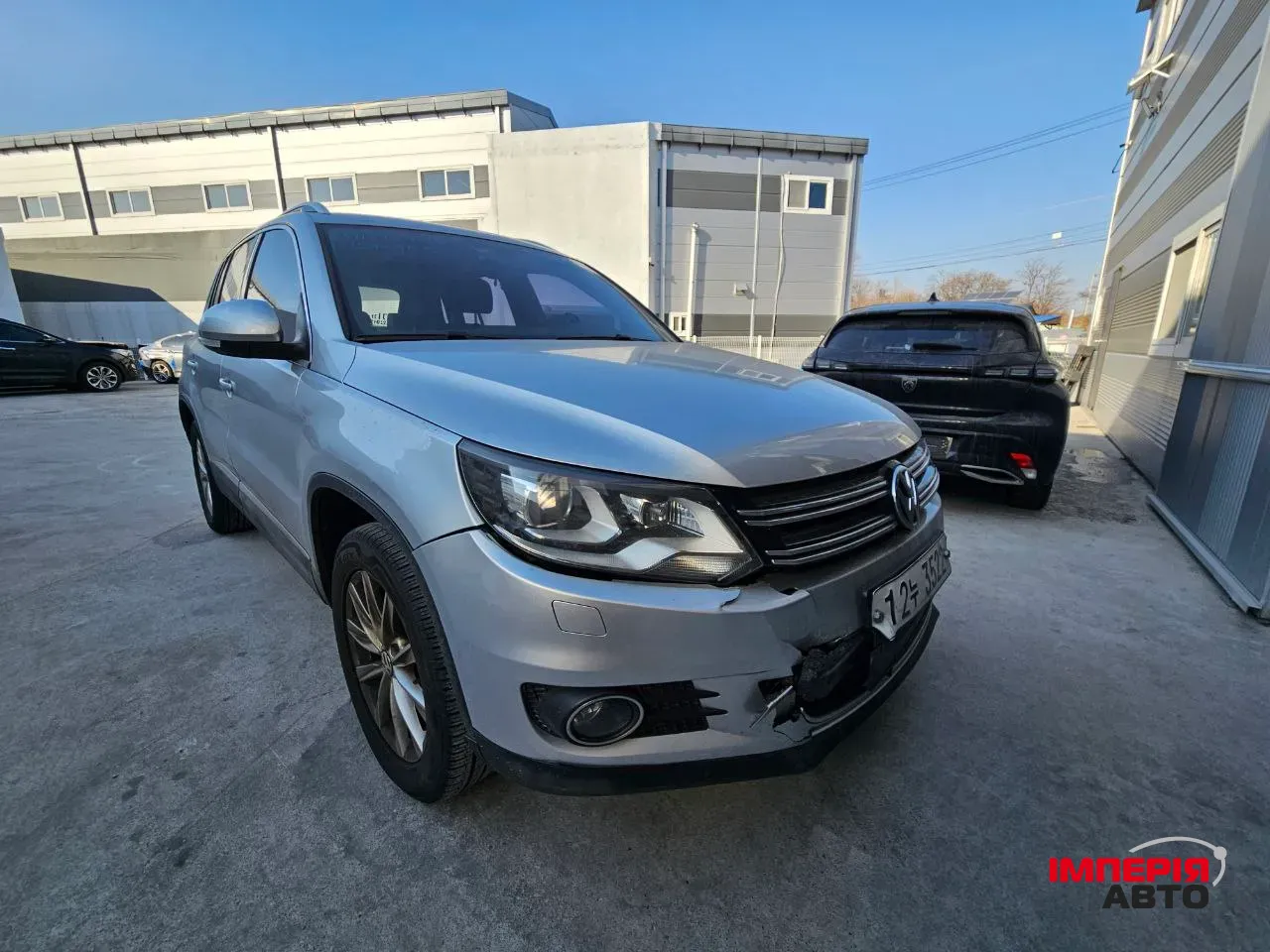 Volkswagen Tiguan - фото 6