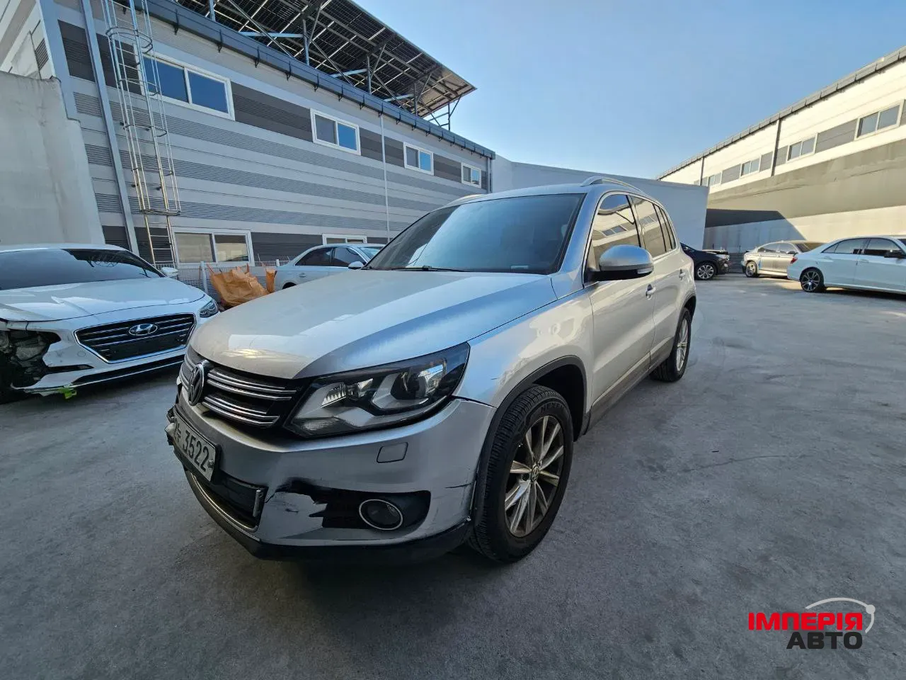 Volkswagen Tiguan - фото 1