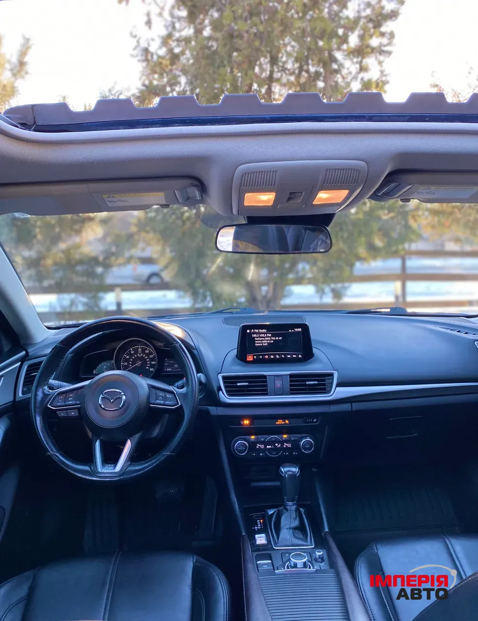 Mazda 3 - фото 8