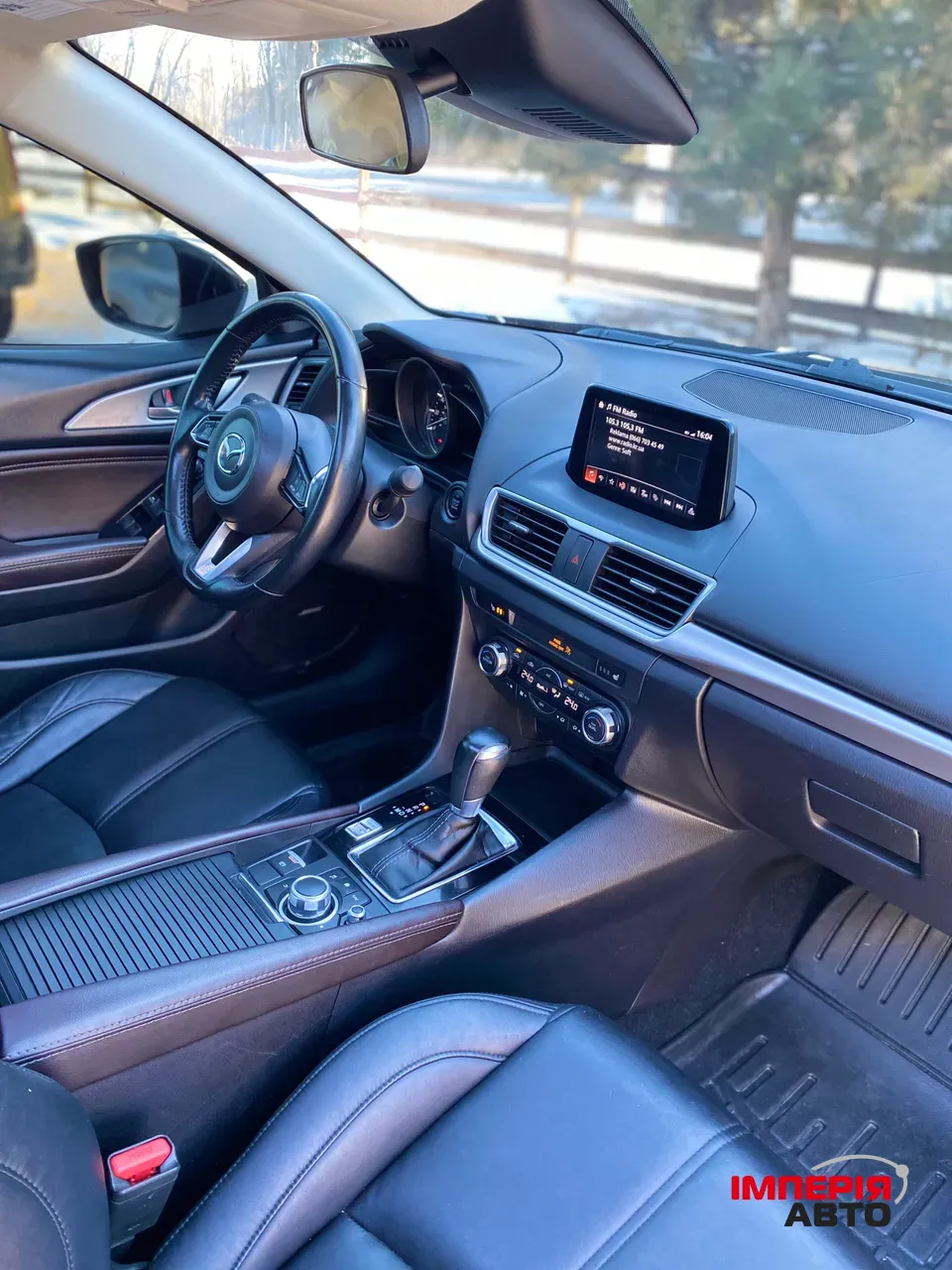 Mazda 3 - фото 6