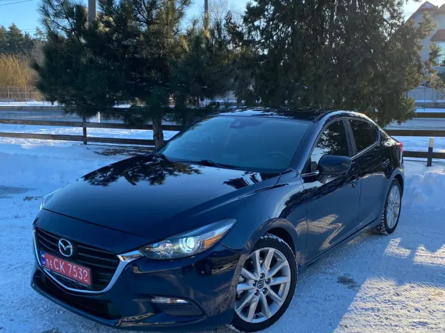Mazda 3 - фото 2