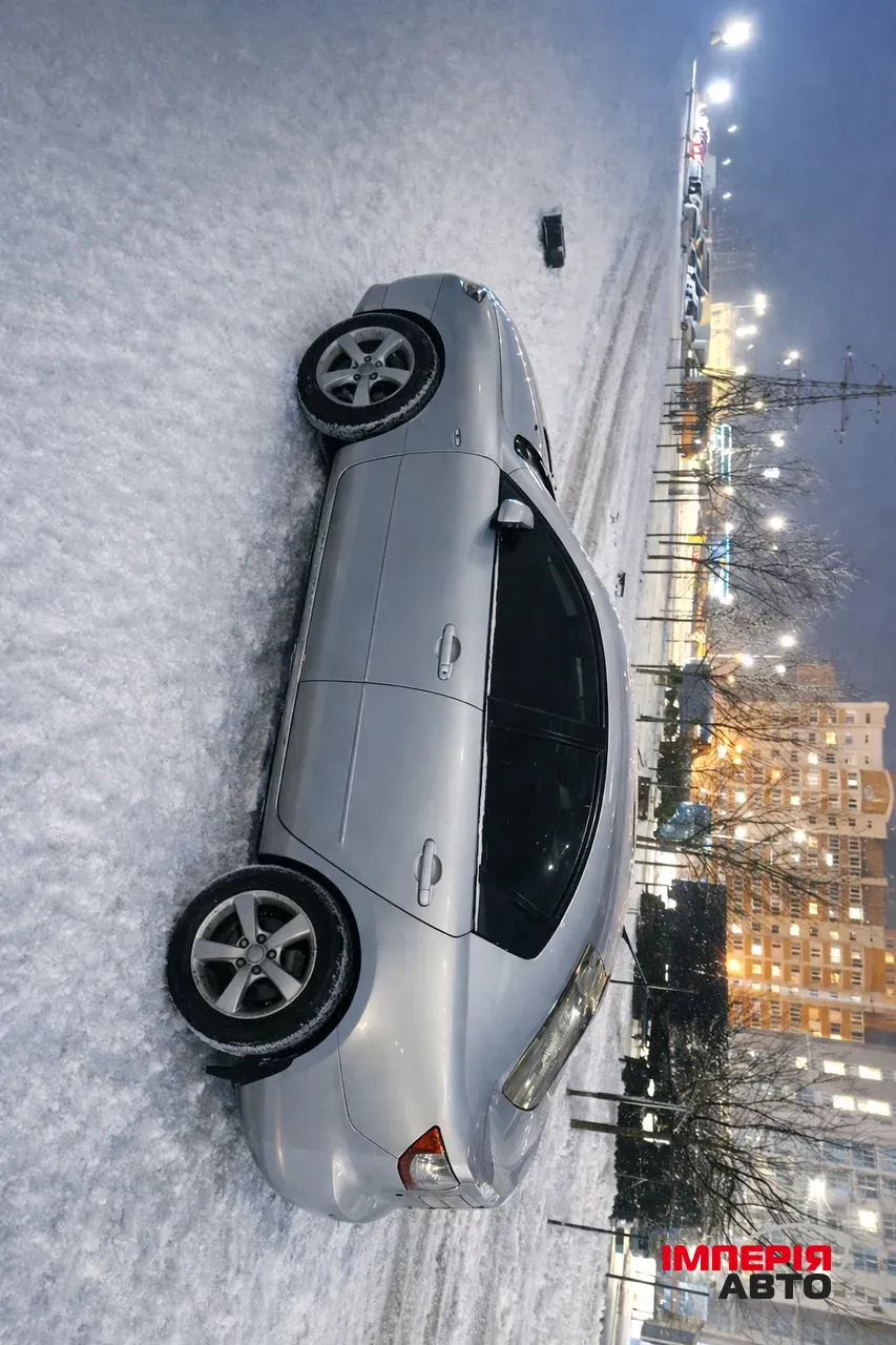 Mazda 3 - фото 2