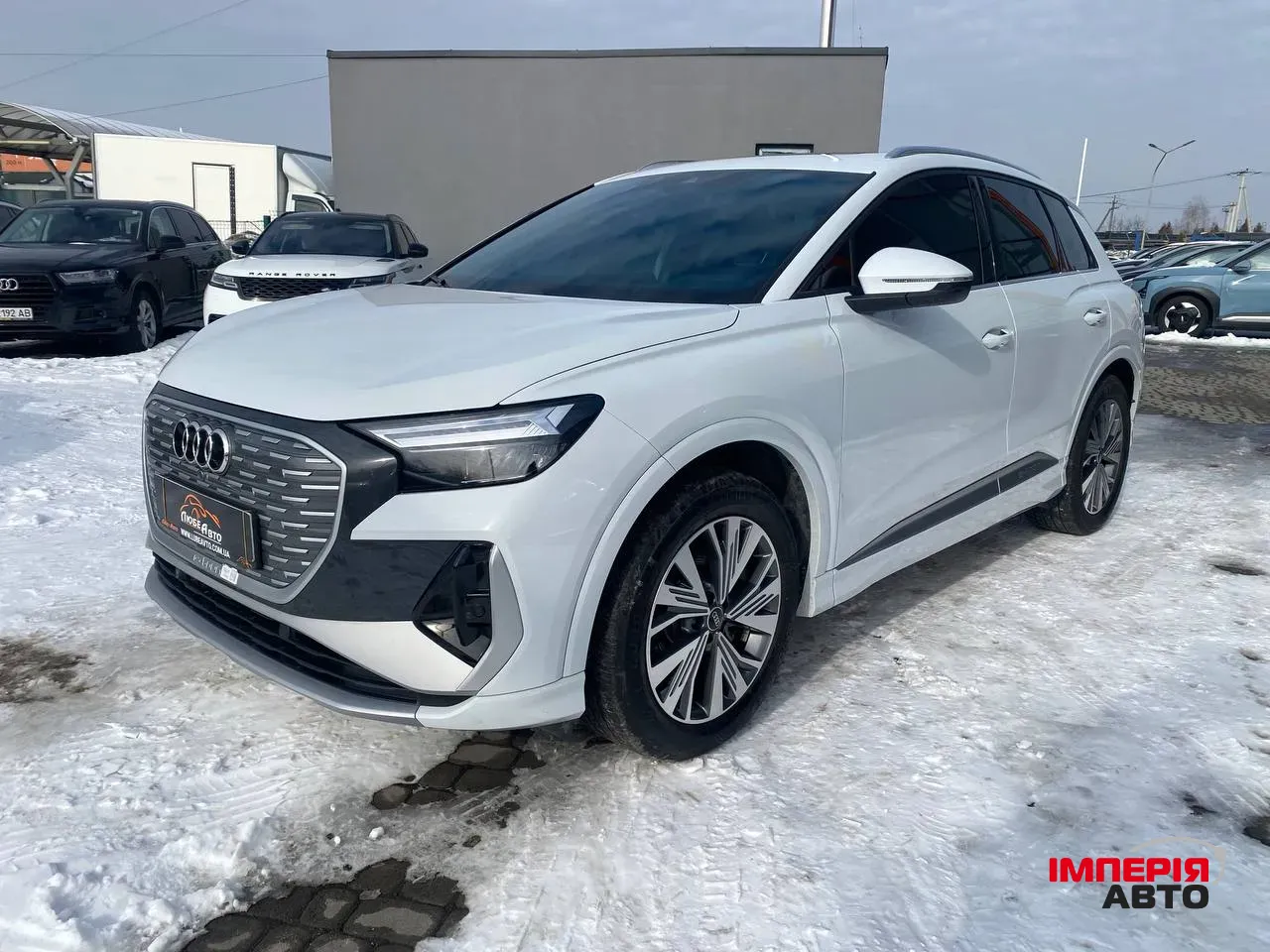 Audi Q4 e-tron - фото 1