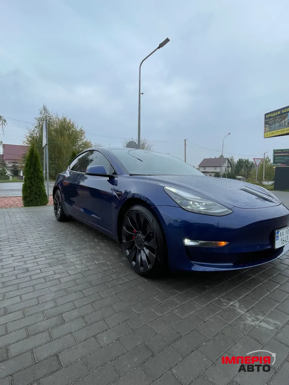 Tesla Model 3 - фото 1