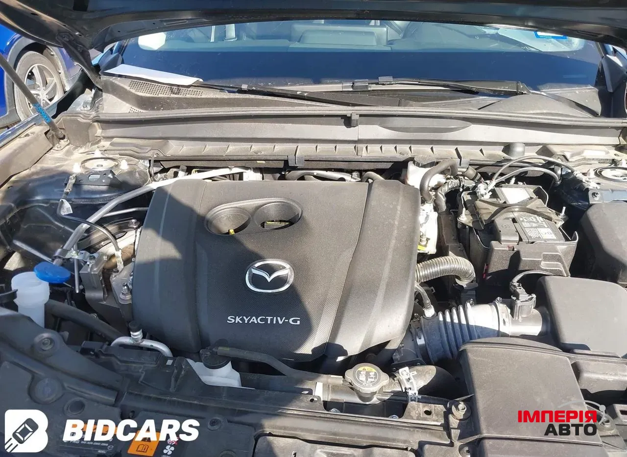 Mazda CX-50 - фото 10