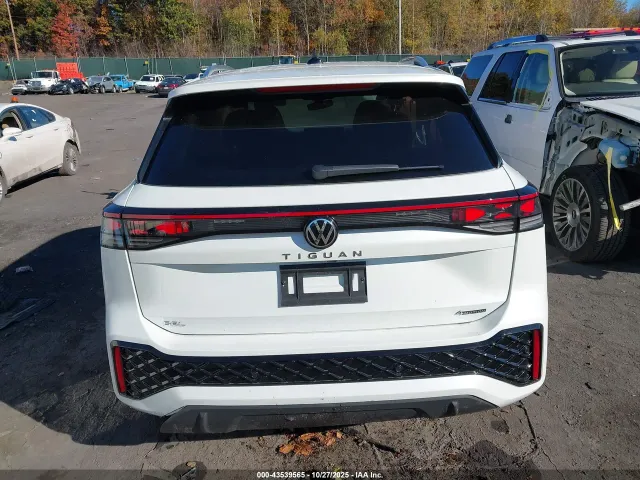 Volkswagen Tiguan - фото 2