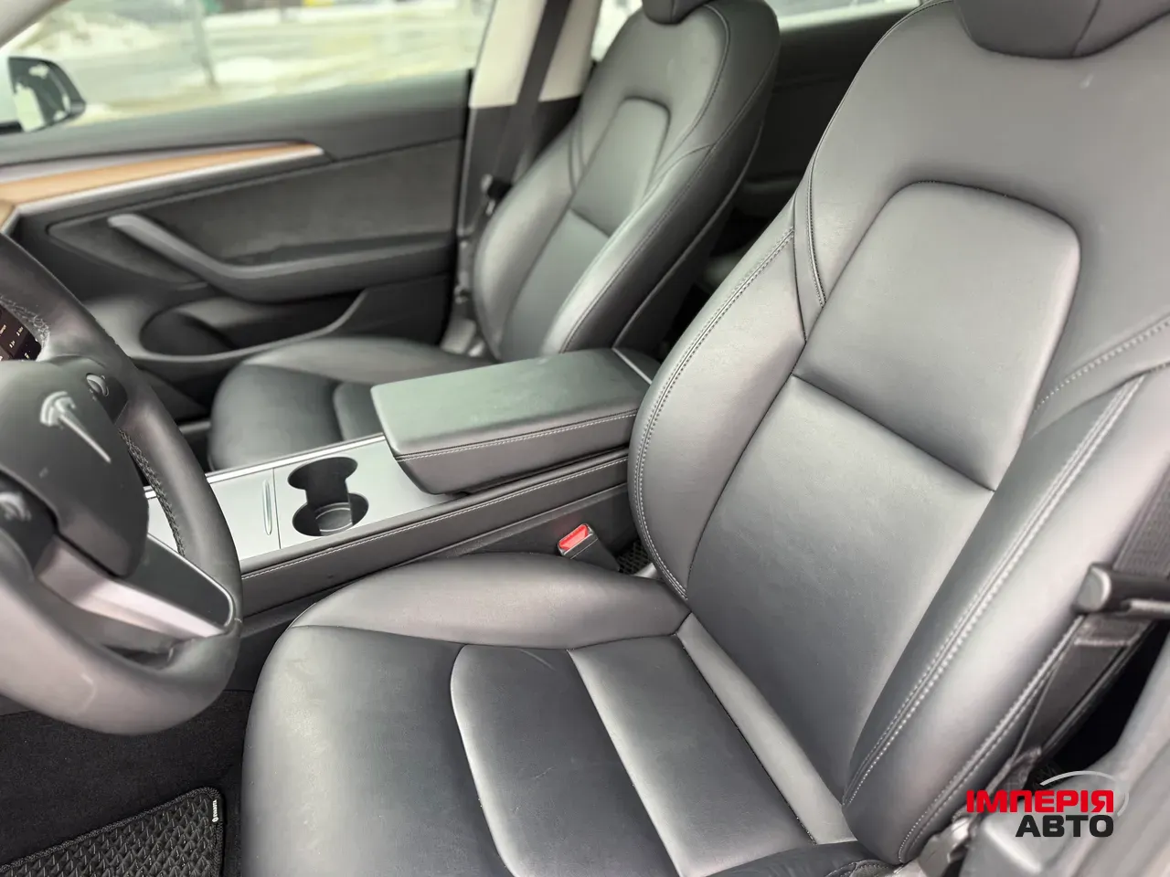 Tesla Model 3 - фото 10