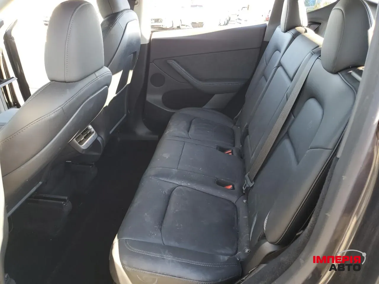 Tesla Model Y - фото 11