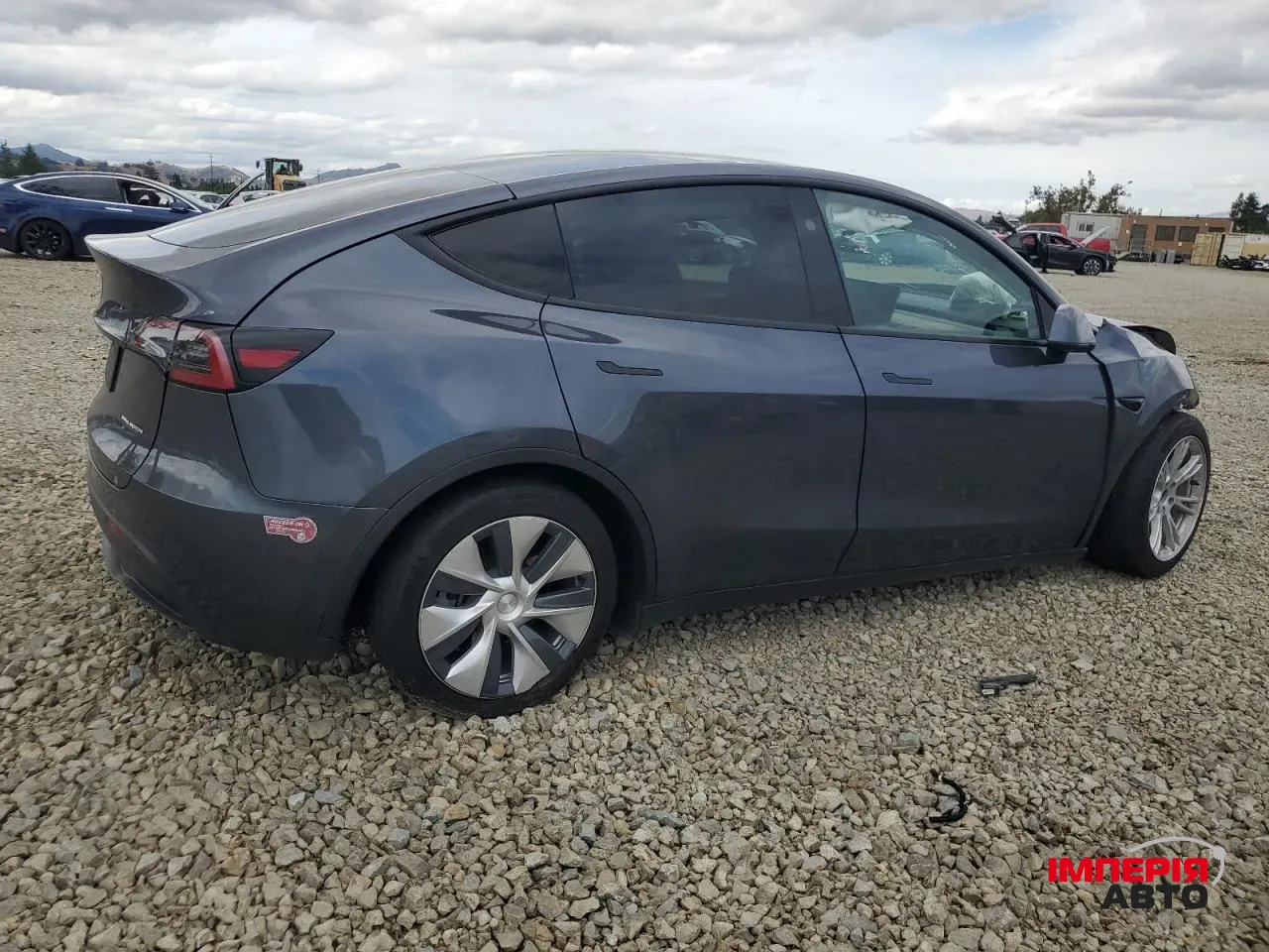 Tesla Model Y - фото 2