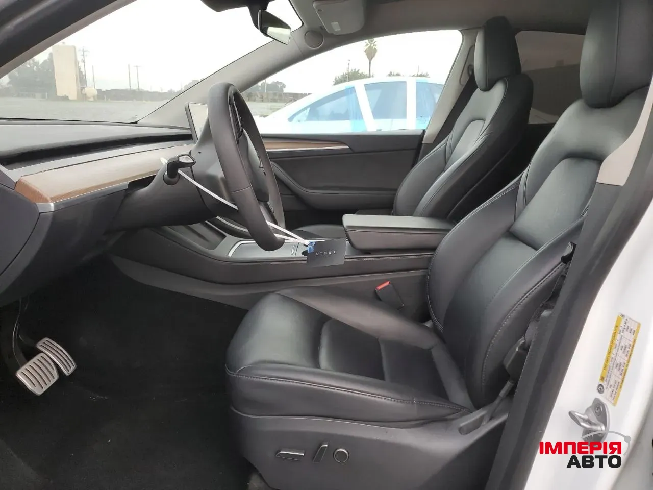 Tesla Model Y - фото 9