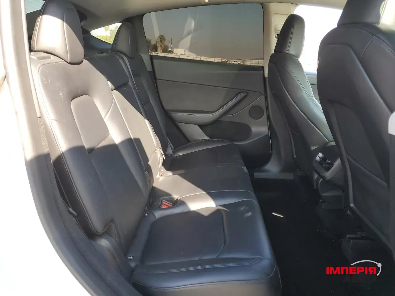 Tesla Model Y - фото 8