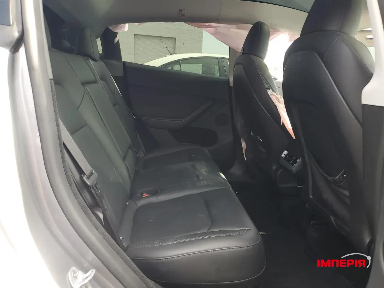 Tesla Model Y - фото 11