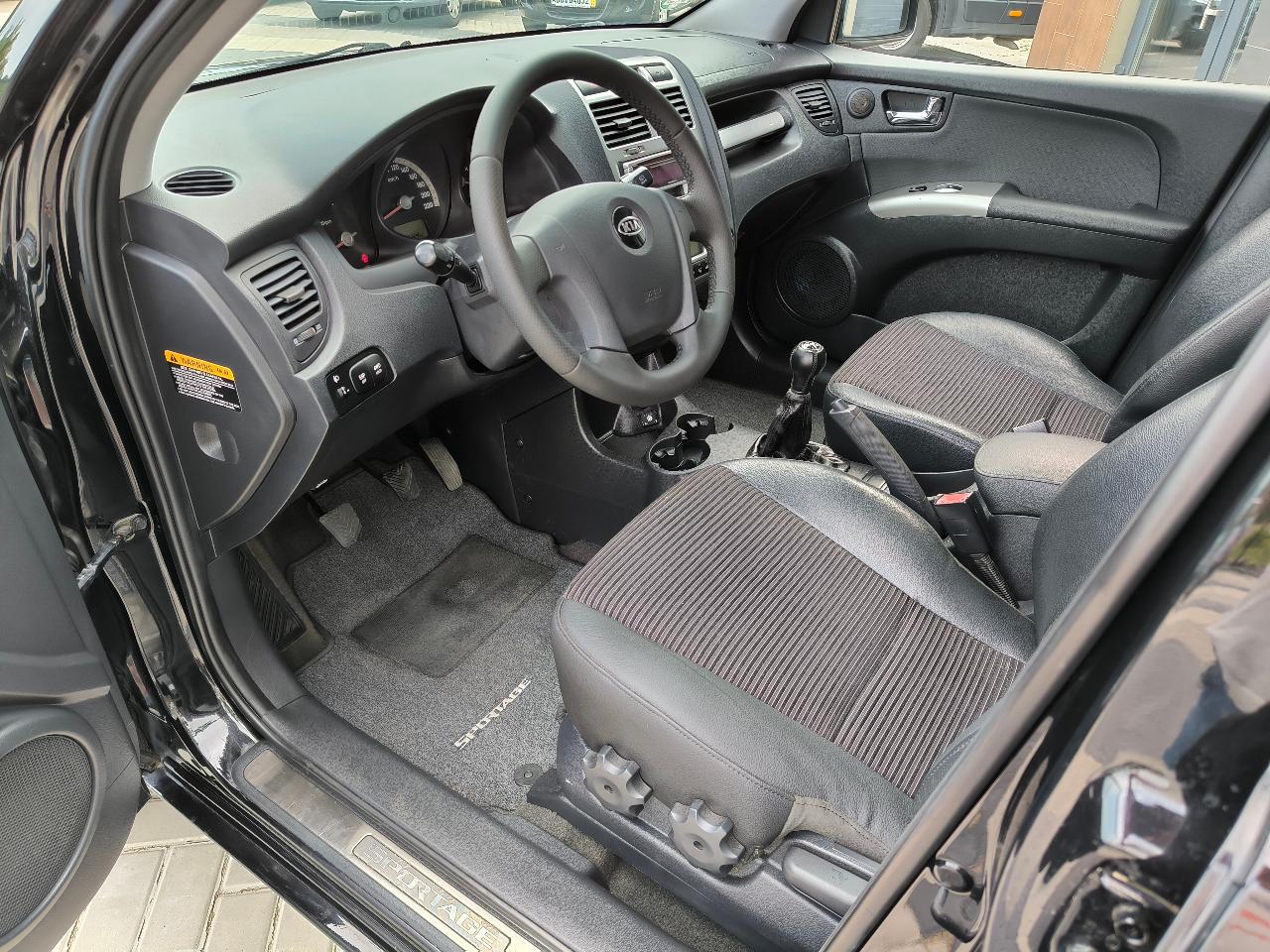 Kia Sportage - фото 12
