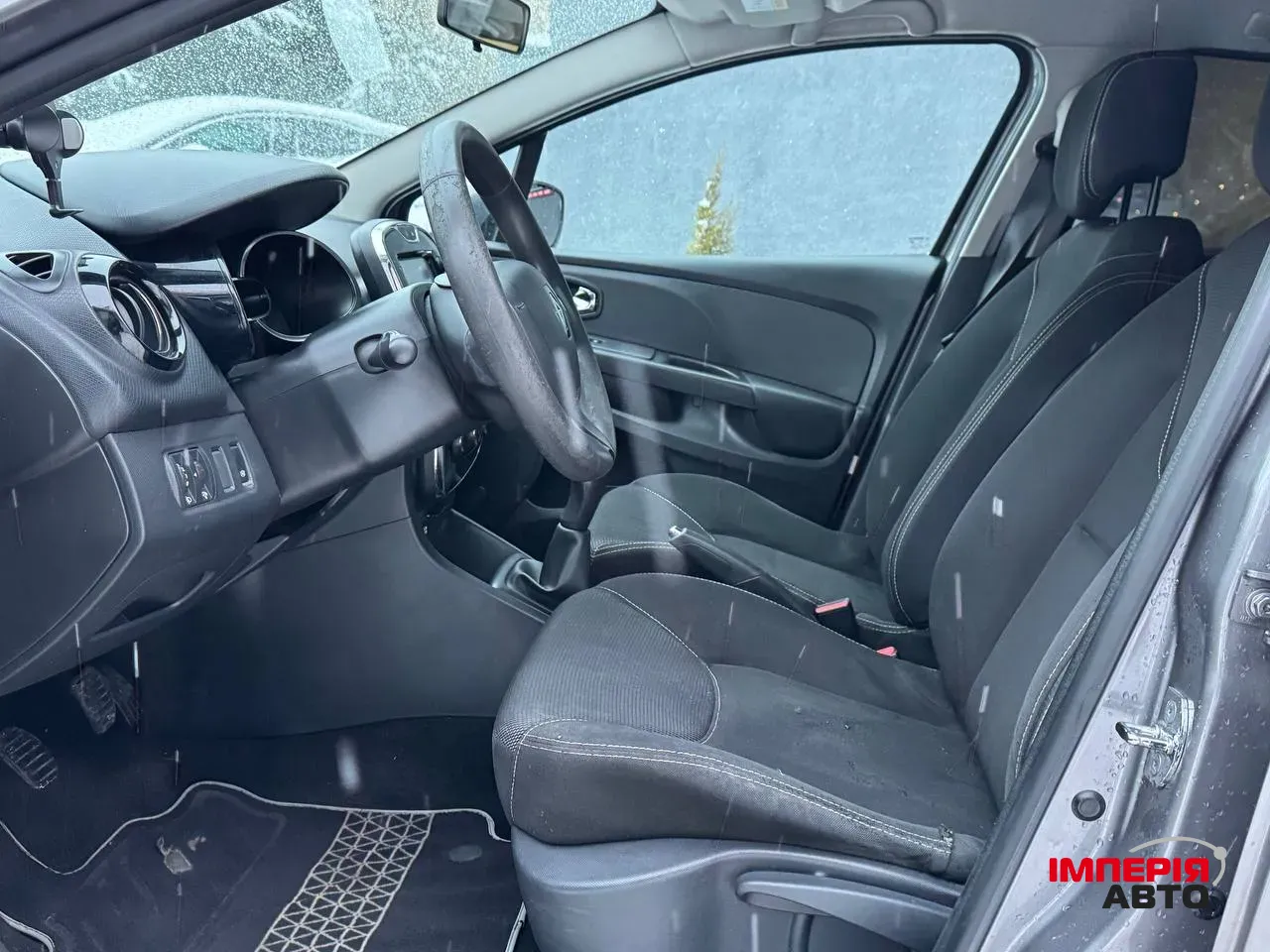 Renault Clio - фото 12