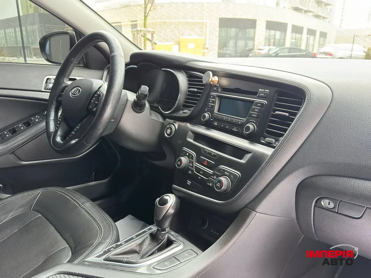 Kia Optima - фото 18