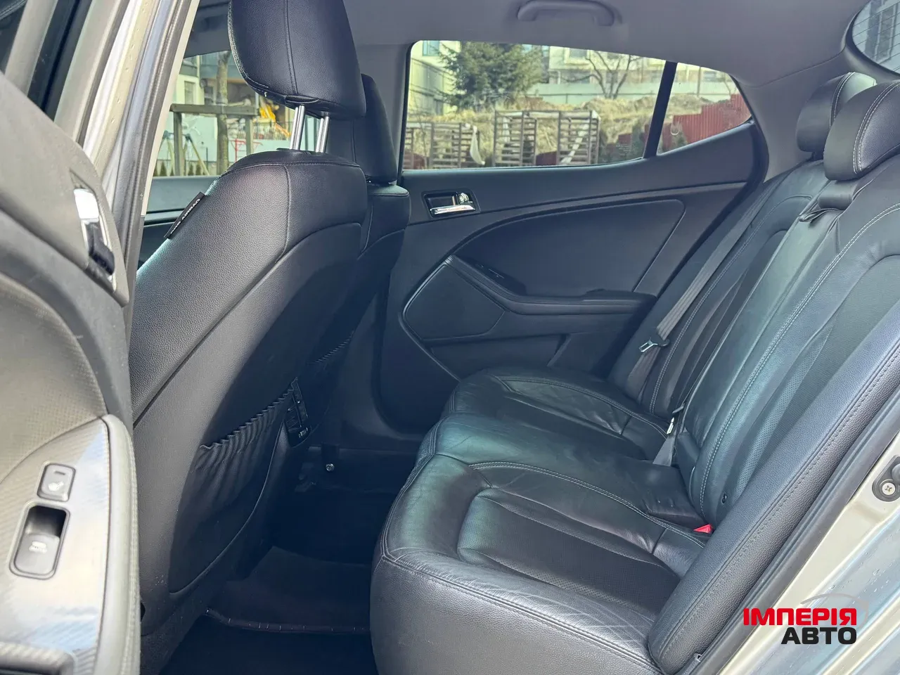 Kia Optima - фото 14