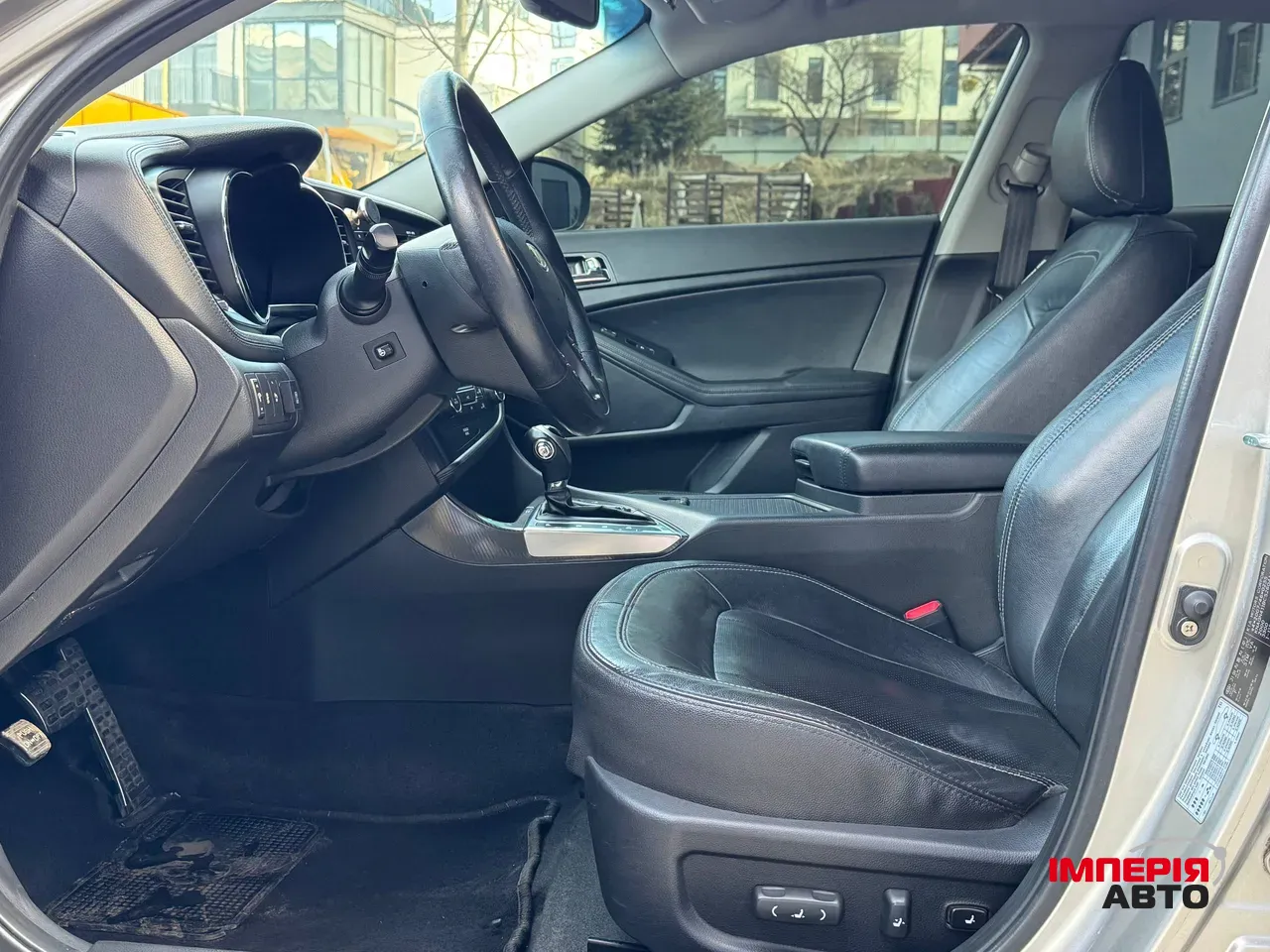 Kia Optima - фото 13
