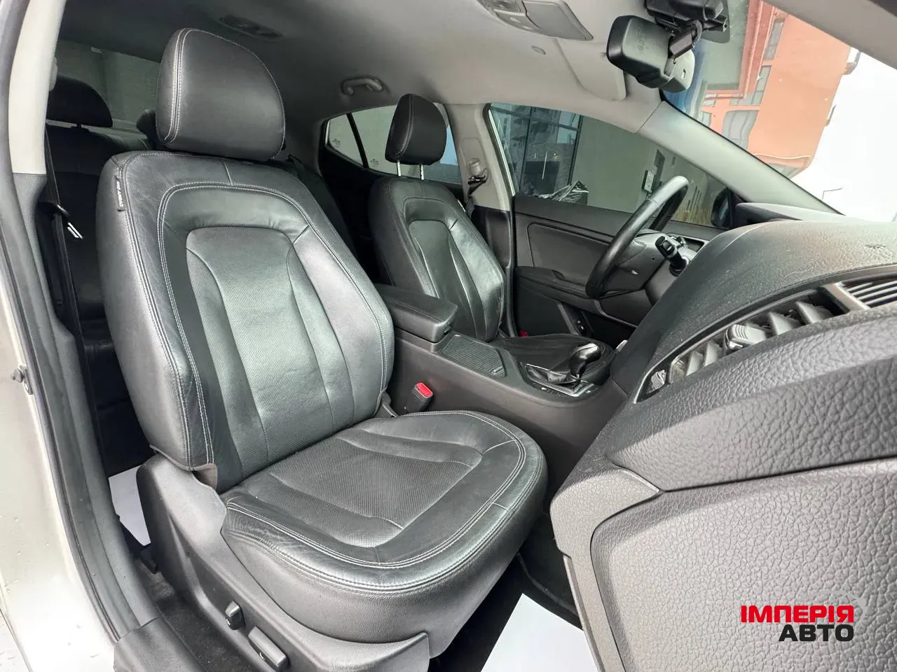 Kia Optima - фото 17