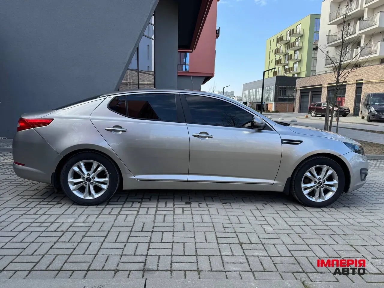 Kia Optima - фото 7