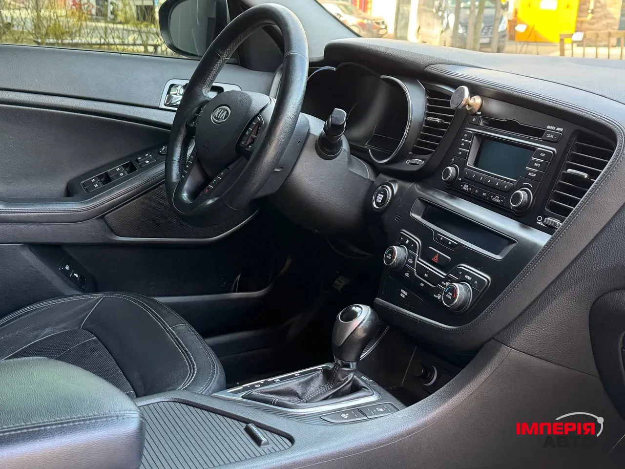 Kia Optima - фото 16