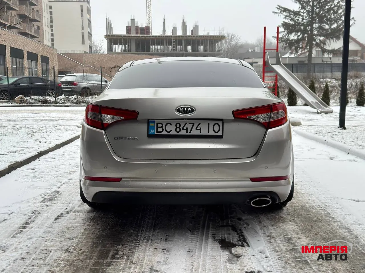 Kia Optima - фото 9