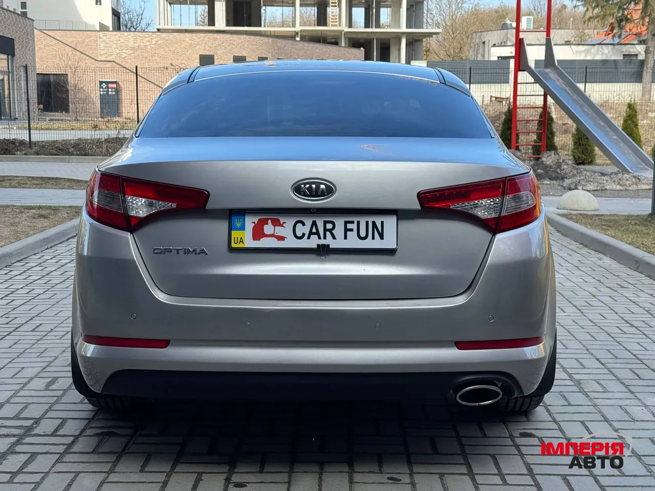 Kia Optima - фото 5