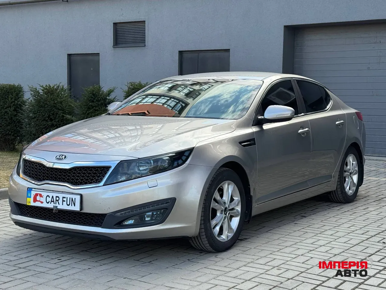 Kia Optima - фото 1