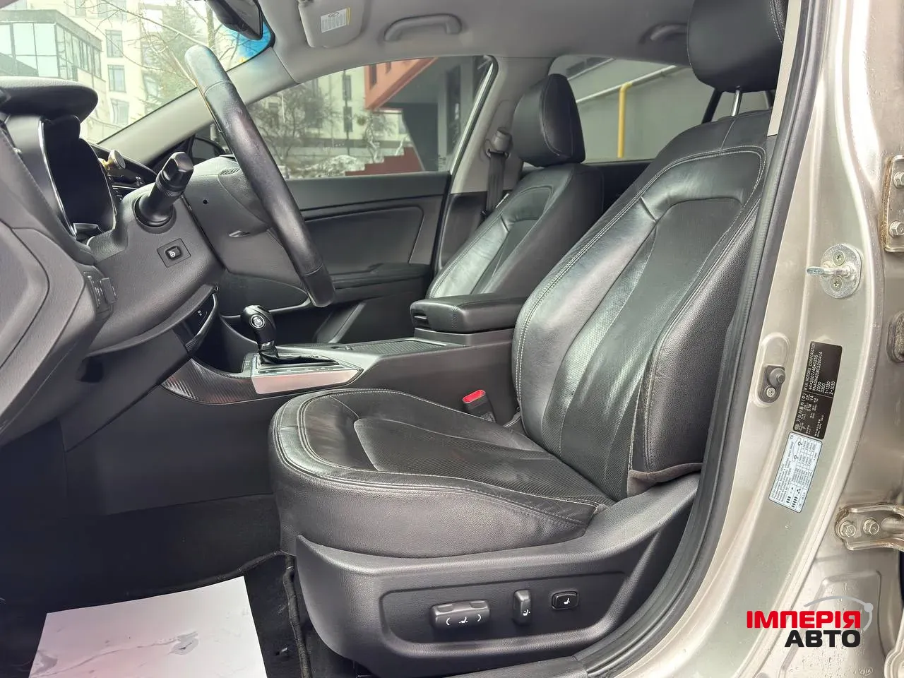 Kia Optima - фото 5