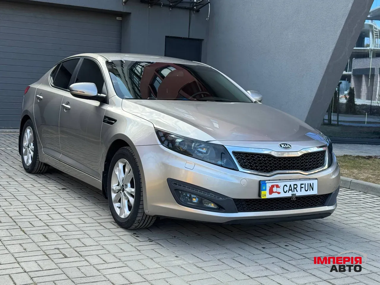 Kia Optima - фото 3